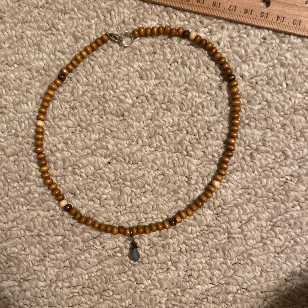 brown necklace with blue charm!